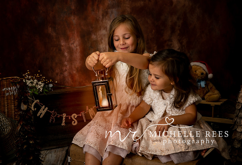 Sisters at Christmas 
 Studio & Outdoor Essex Photographer 
 Keywords: family, family photographer, Essex photographer, Essex family photographer, professional photographer, professional school photographer, professional studio photographer, experienced photographer, experienced studio photographer, experienced nursery photographer, experienced pre-school photographer, experienced nursery photographer in Chelmsford, experienced nursery photographer in Essex, experienced pre-school photographer in Chelmsford, Experienced pre-school photographer in Essex, Experienced pre-school nursery photographer in Chelmsford, experienced nursery pre-school photographer in Essex, Chelmsford photographer, Chelmsford family photographer, families, family photos, family portraits, michelle rees photography, michelle rees, indoor studio, studio, studio photography, models, sisters, siblings, brothers, daughters, sons, children, kids, grandkids, brothers and sisters, cousins, cousin, xmas, Christmas, xmas mini, xmas mini shoot, school photo, school photos, school photography, nursery, nursery photography, nursery photos, preschool photos, preschool photographer, photographers in Chelmsford, photographers in Essex, photographers in springfield, newlands spring, family celebration, photos of the family, writtle photographer, smiling, getting the shot, smile, happy, fun, laugh, joke, cuddle, studio lights, colours, santa, winter, twins, triplets, babies, santa, santa photoshoot, vintage photoshoot, Victorian photoshoot, school photos, nursery pics, pre-school pics, pre-school photographer, Essex pre-school photographer, Chelmsford pre-school photographer, The best pre-school photographer in Chelmsford, The best nursery photographer in Chelmsford, The best pre-school photographer in Essex, The best nursery photographer in Essex,